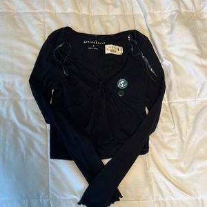 Small aeropostal, cropped, long-sleeved shirt.